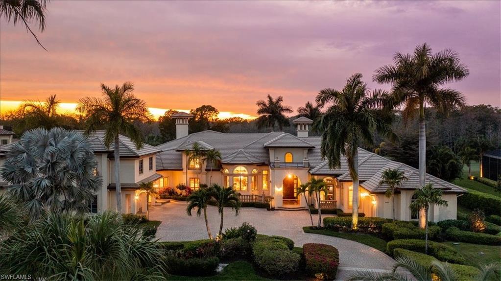 This exquisite estate home offers luxury and sophistication.  The thoughtfully designed great room floor plan includes a gourmet chefs kitchen, Sub Zero refrigerator and freezer, Miele dishwasher, and Wolf range and cooktop, a massive butlers pantry with another full size Sub Zero refrigerator and Miele dishwasher, beautiful custom wet bar, custom theater room designed for a golf simulator complete with turf grass, 5 garages with polyaspartic flooring, whole house generator, electric hurricane shutters, etc.  The master suite is a tranquil oasis with views of the pool and golf course and offers enormous, luxurious separate bathrooms and closets.  Each of the additional 4 bedrooms offers baths en suite and the 3 suites on the main floor each have french door walk outs.  This home was exquisitely updated in 2019 and no expense was spared in the fine finishes and detail.  Update includes new flooring throughout, interior and exterior paint, complete kitchen and butler update including solid wood cabinetry throughout, additional 1363 in living space, and more.  Please see attachments for additional notable features. A Full Golf Membership with paid assessment is available.