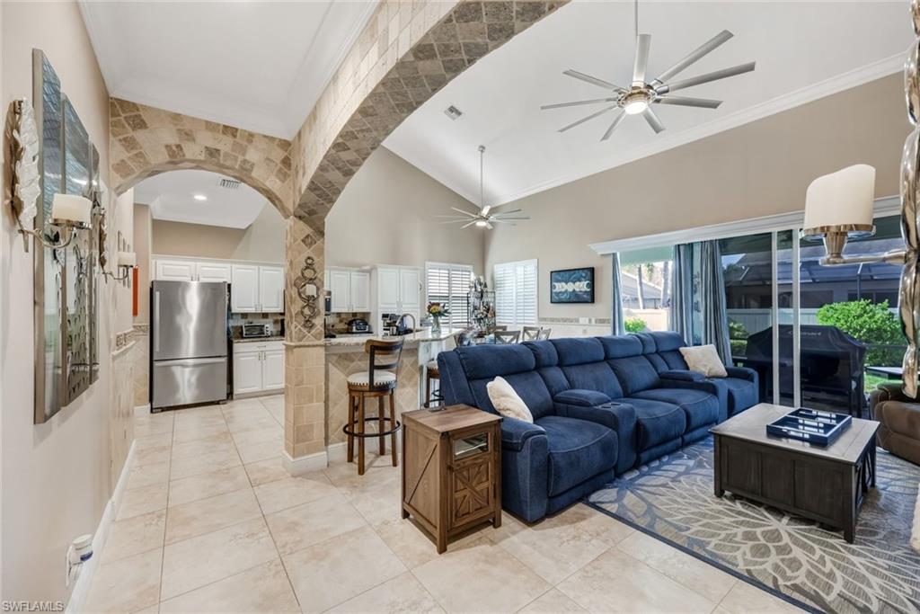 Spacious, versatile, and thoughtfully designed, this 3-bedroom plus den/loft, 2.5-bath home in the gated community of Pebblebrooke Lakes offers 2,760 square feet of flexible living space with room to grow. One of its most impressive features is the expansive second-floor loft, an ideal bonus space that offers endless possibilities as a media room, playroom, home office, fitness area, or could easily be converted into a 4th bedroom to suit your needs. The first-floor primary suite provides the convenience of main-level living with a spacious en-suite bath and generous closet space, while two additional bedrooms upstairs offer privacy for family or guests. The open-concept floor plan is filled with natural light and enhanced by granite countertops, stainless steel appliances, crown molding, and plantation shutters, creating a timeless and elegant feel throughout. The kitchen flows seamlessly into the living and dining areas, making it perfect for everyday living and entertaining. Step outside to the large screened lanai overlooking the fully fenced backyard, offering plenty of space for children, pets, or future outdoor enhancements. Pebblebrooke Lakes is a sought-after gated North Naples community featuring low HOA fees and resort-style amenities, including a community pool, all just minutes from top-rated schools, shopping, dining, Gulf beaches, and convenient access to I-75. This exceptional home offers the perfect combination of space, flexibility, and location.
