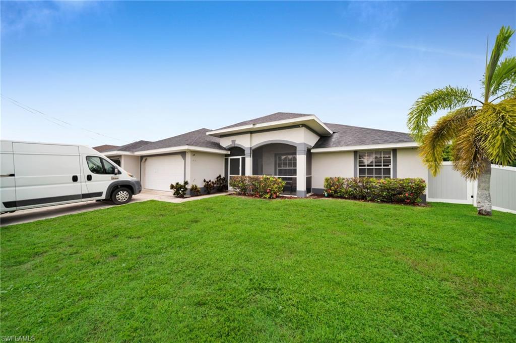 Stunning, fully remodeled home in a quiet Cape Coral neighborhood! This move-in-ready property features 3 spacious bedrooms, a den converted into a fully equipped office, and 2 renovated bathrooms with modern finishes. The kitchen boasts elegant cabinetry, quartz countertops, subway tile backsplash, high-end stainless steel appliances, and a center island perfect for entertaining. Tile flooring flows throughout, complemented by crown molding for an elegant touch. Electric zebra shades add style and convenience areas. The fully enclosed lanai is perfect for a quiet afternoon coffee overlooking the backyard. The spacious 3-car garage offers plenty of storage. Located in a peaceful residential area close to schools of all levels, with easy access to restaurants, supermarkets, gas stations, and major thoroughfares. A true turnkey home combining comfort, functionality, and style. Don't miss this opportunity and make your appointment!!