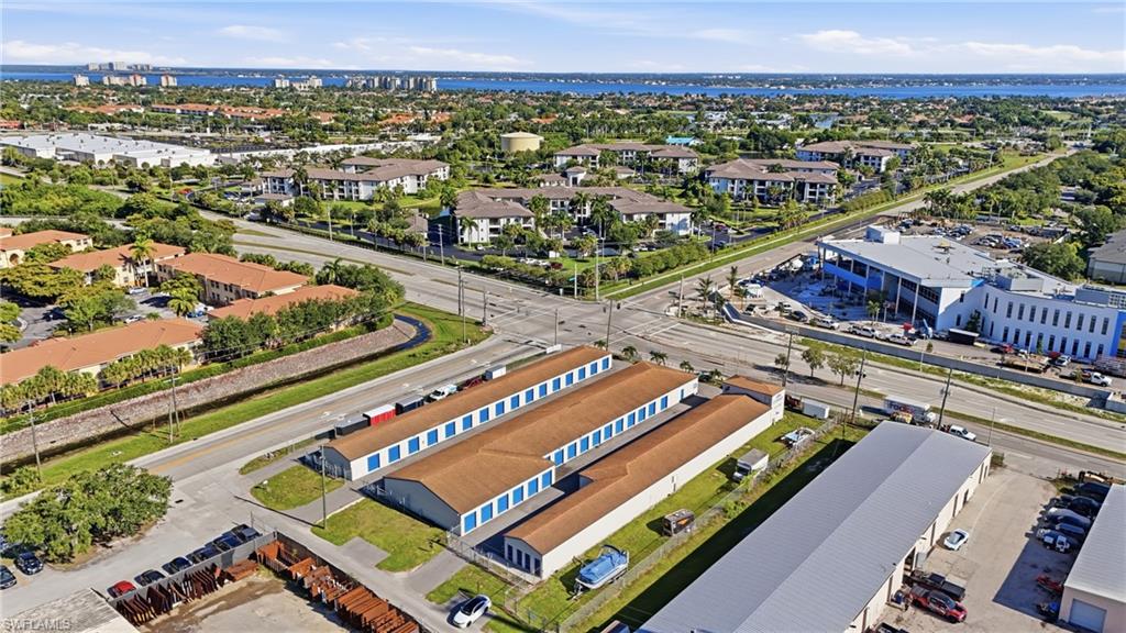 Rare opportunity to acquire Storage Quarters, a stabilized, highly automated 176-unit self-storage facility on an irreplaceable signalized hard corner at Gladiolus Drive (SR 865) and Pine Ridge Road in fast-growing south Fort Myers. Three single-story, drive-up, concrete-block buildings (approx. 19,720 SF) sit on 1.24 acres, complemented by outdoor RV/vehicle parking and mailbox rentals. Customers pull directly to their unit, with no elevators or long interior hallways, a convenience that resonates with the area's boaters, contractors, retirees, and seasonal residents.

Location is the headline. Gladiolus Drive is a six-lane arterial carrying roughly 21,300 vehicles per day at the frontage and about 44,600 per day, delivering exceptional visibility and signage exposure. Lee County is among the nation's fastest-growing markets, up roughly 15% since 2020 to about 876,000 residents and projected near 1,000,000 by 2045, an expanding and mobile customer base that fuels storage demand. Southwest Florida's boating and RV lifestyle and a seasonal "snowbird" influx create steady, recurring demand for drive-up and vehicle/RV storage.

The business runs almost entirely online through the Cubby AI platform: tenants reserve, lease, pay, and manage autopay from any device, while machine-learning revenue management moves customers in at promotional rates and steps them up automatically. The result is in-place rents that exceed street rates and about 109% economic occupancy. A part-time on-site manager is compensated with an apartment, so there is NO cash management salary, keeping the operation lean and largely absentee-friendly. Required SafeLease tenant protection adds recurring ancillary income.

Upside is built in. Standard storage units run about 84% occupied, with lease-up runway concentrated in small lockers and RV parking. Continued AI-driven rate increases and a vertical (stilt) expansion concept, adding a 2nd/3rd story and climate-controlled product the local market offers but Storage Quarters does not, provide multiple paths to grow NOI. Split CG/IL zoning supports storage and expansion. The corner lies in Flood Zone AE yet took no flooding during Hurricanes Ian, Milton, or Helene.

Pride of ownership shows: about $80,000 of recent capital improvements, including new roofs (2018), exterior paint (2024), asphalt sealcoat (2025), and a new high-efficiency A/C (2026), mean low deferred maintenance for a new owner. Offered at $3,140,000, a 5.0% in-place cap with pro forma yields growing toward roughly 7%, a rare turnkey, cash-flowing asset with a clear growth runway on one of Fort Myers' best corners.

Complete financials, rent roll, occupancy reports, leases, survey, site plan, insurance, and capital records are available in the secure data room. A confidentiality/non-disclosure agreement is required: click the link to review and sign the agreement and gain immediate access. https://docsend.com/view/s/cfgvcfs32qa3ggkv