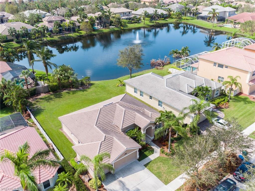 Lowest priced home and the biggest back yard in Indigo Lakes! This amazing open and bright home has three bedrooms and a den with tile floors throughout living areas and wood floors in all bedrooms.  Enjoy the unique privacy combined with a great view of the lake from the large backyard. With a three car garage and located in one of the best school district in Collier County this home is a must see.