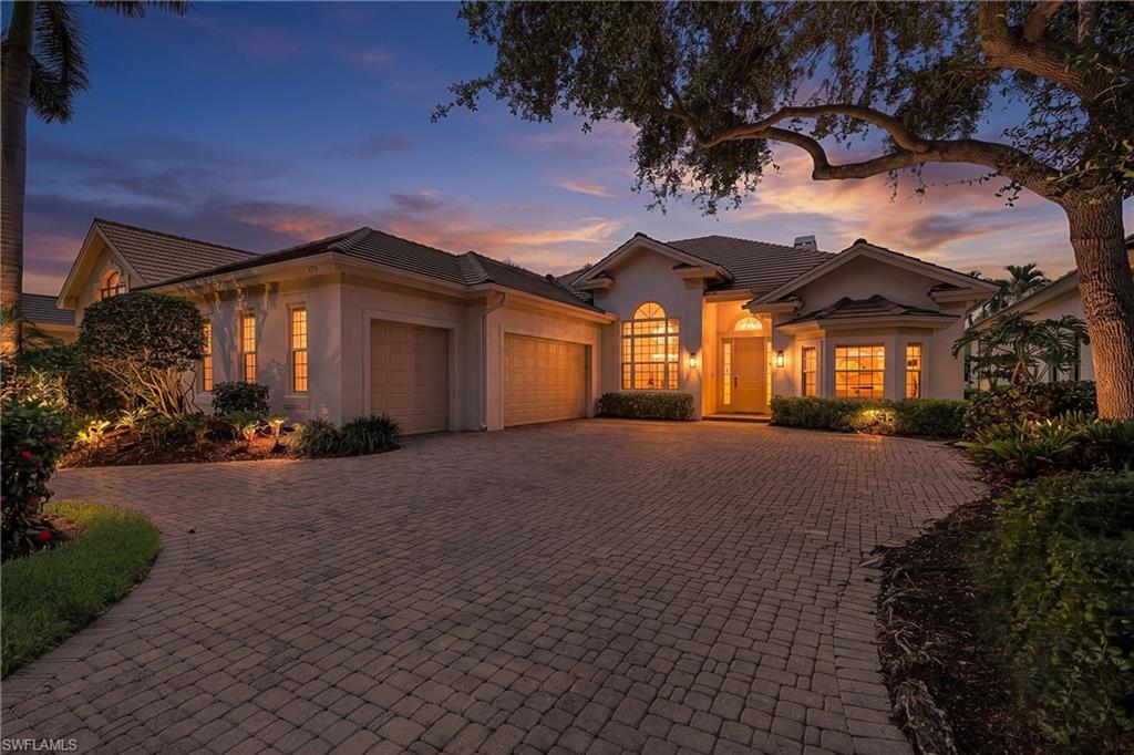 Beautiful golf course home in Audubon Country Club offering luxury and comfort. This custom residence features an open floor plan with generous living spaces, neutral tile flooring, and a bright, welcoming ambiance.
The well-designed split layout includes three bedrooms plus a flex den and two full baths plus a half bath. Multiple dining options create easy flow for everyday living and entertaining, including a formal dining room, a separate eat-in kitchen area, and a breakfast bar. The kitchen also offers a large pantry for excellent storage. A THREE-CAR GARAGE provides exceptional convenience and storage flexibility, and the exterior has been freshly painted, enhancing the home’s crisp, updated presentation.
Positioned along the 12th hole, the home enjoys beautiful sunset views across the golf course from the expansive covered lanai—ideal for outdoor dining, relaxing, and hosting gatherings. The lanai was rescreened recently, and the property offers plenty of room to add on, giving future owners the ability to expand living space as desired.
Recent improvements include a newer roof (09/2023) and newer HVAC units, providing peace of mind and long-term value. Audubon Country Club is a private, gated, full-service country club west of US-41, just minutes from the white sandy beaches of Naples and Bonita Springs, world-class dining, shopping, and convenient airport access. A beautifully maintained home with modern finishes and stunning golf course vistas—ready to enjoy the Audubon lifestyle.