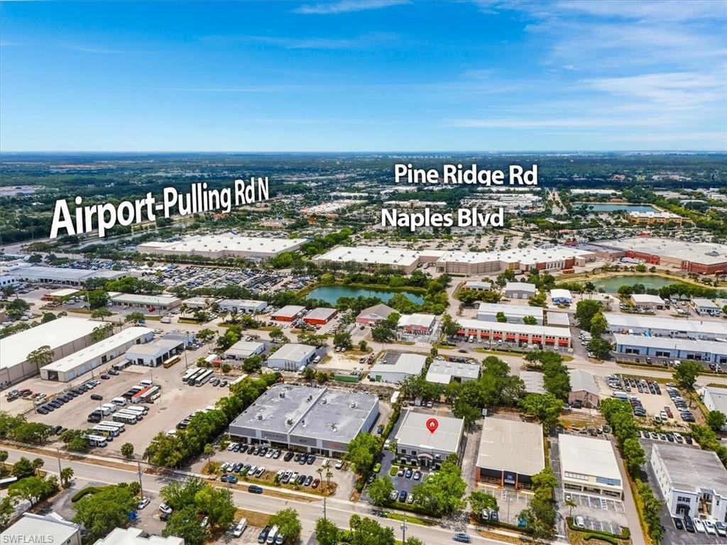 Seize a rare opportunity to own a versatile two-story industrial flex building in one of Naples' most sought-after commercial corridors. This impressive 9,776-square-foot standalone property at 2224 Trade Center Way offers the ideal blend of functionality and location, featuring approximately 75% office space and 25% warehouse—perfect for businesses demanding both professional presence and operational capacity. Constructed with durable concrete block and a metal roof, this property includes exterior roll-up doors in the rear and a layout currently configured for single-tenant use. Enjoy seamless access to Pine Ridge Road and Airport-Pulling Road, with the Naples Blvd Shopping Center just steps away for everyday conveniences. Whether you're expanding your business footprint or seeking a strategic investment in Southwest Florida's thriving market, this versatile commercial property delivers exceptional potential in an incredible Naples location.
