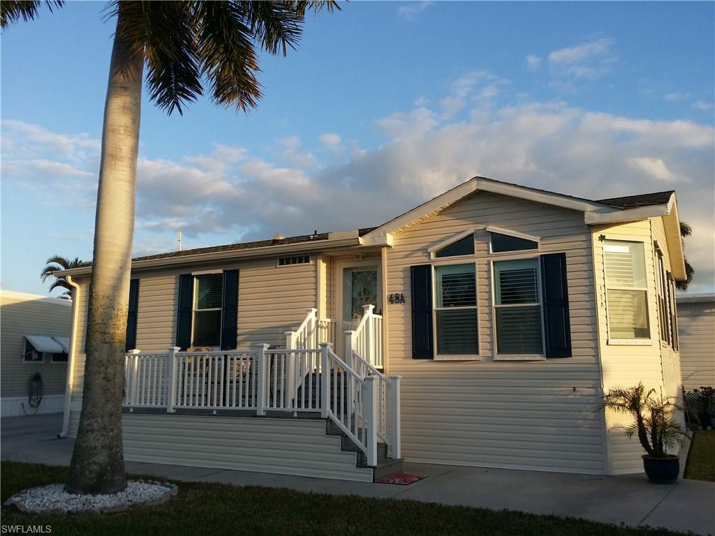 THIS IS A GREAT OPPORTUNITY TO OWN A BEAUTIFULLY TURN KEY FURNISHED, LIKE NEW HOME IN THE 55+ MANUFACTURED WATERFRONT/BOATING COMMUNITY OF PORT CARLOS COVE.  YOU HAVE EVERYTHING YOU NEED TO LIVE THE TROPICAL, FORT MYERS BEACH LIFESTYLE---------- AMENITIES INCLUDE A HEATED POOL, SHUFFLEBOARD COURTS, COMMUNITY CLUBHOUSE AND BOAT RAMP, ALL WITHIN YOUR COMMUNITY. IN ADDITION, YOU ARE ONLY MINUTES AWAY BY BIKE, BOAT, CAR OR A SCENIC WALK TO THE WHITE SANDS OF FORT MYERS BEACH.