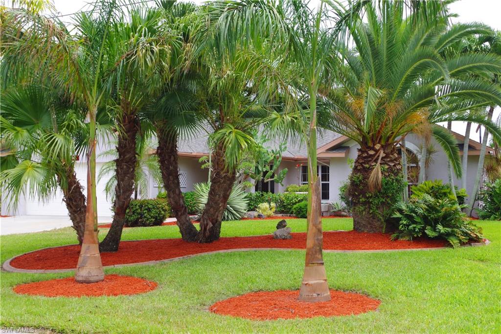 What more could you ask for in this beautifully updated, Direct Gulf Access home! 4 Bedrooms, 2 Full Baths, plus a 1/2 Pool Bath, 2 car garage, heated pool on a direct access Canal. At the front of the house you're greeted with a pavered courtyard and large covered porch that opens into a formal foyer. From there you'll find a very fluid, open floor plan with vaulted Living Room and Dining area, kitchen, Breakfast Room and vaulted Great Room. The main living areas open onto the screened pool lanai via sliding and French doors. The kitchen offers wood cabinets, granite counters, stainless steel appliances including a wine cooler and Breakfast Bar. On one side of the split floor plan is the en suite Master Bedroom that also opens onto the lanai; Bath with dual vanity, soaking tub, private commode and shower. Adjacent is a 2nd BR that's being used as an office. Guest Bedrooms 3 and 4 are privately tucked behind the kitchen along with the Guest Bath. Large under truss seating area under the lanai, 1/2 pool bath, concrete deck and wooden dock along the water. New pool pump and filter. Great South Cape Coral location close to restaurants, shopping, and just minutes to the river.