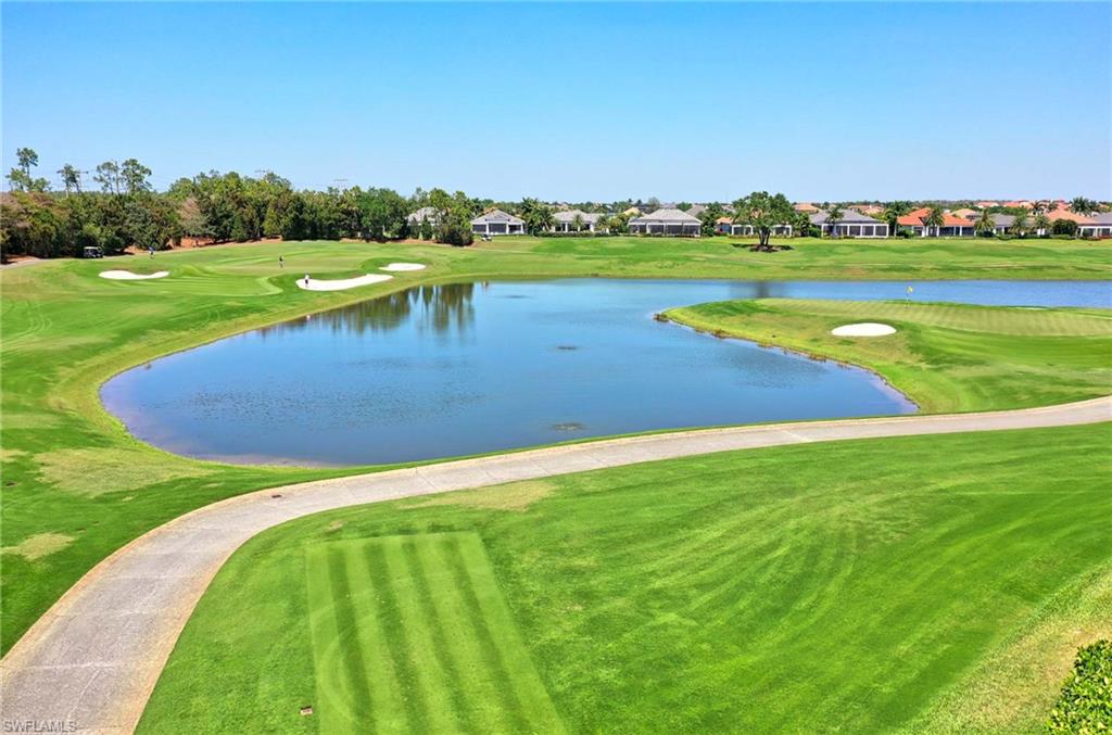 EXPANSIVE GOLF COURSE VIEWS AND OUTDOOR KITCHEN with the only Spectacular Corsica coach home building on the course. Tucked away on a cul-de-sac, upgrades such as extra sound dampening insulation in all side walls and floors make this a haven unlike most others. Presented fully furnished, including decor, with Clive Daniels and Robb & Stucky selections and stunning designer lighting. Private elevator and en suite bedrooms. Pristine European White Oak flooring flows throughout the main living and master bedroom, elevator and pantry. A 20 foot high ceiling invites one into the expanse of crisp and clean-lines and refined living. Natural gas cooking on commercial range with side griddle and heat lamps. Wood beams and wood barrel ceiling just two of the many upgrades in millwork. Master suite includes access to over 500 square feet of covered lanai space with built in outdoor kitchen. Decorative millwork throughout the residence, bring together design and execution. Impact resistant windows, doors and sliders. Near the Talis Park Sports complex, shuttle to beach. Custom built pantry, and custom master closet. Easy-Go Golf Cart included with lithium batteries. Far from any road noise.