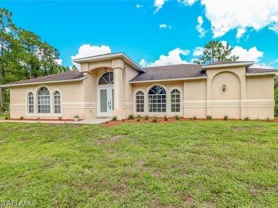 Escape to the privacy and tranquility of Golden Gate Estates in this beautifully furnished 3-bedroom, 2-bath single-family home situated on 2.75 wooded acres. Surrounded by mature trees and natural beauty, this secluded property offers the perfect blend of comfort, space, and peaceful country living while remaining conveniently close to shopping, dining, schools, and Naples amenities.

Inside, you'll find a tastefully furnished interior with a spacious, open layout designed for comfortable everyday living. The home features three well-appointed bedrooms, two full bathrooms, and an attached two-car garage for added convenience and storage.

Outside, the expansive wooded property provides exceptional privacy with plenty of room to park multiple vehicles, trailers, or recreational equipment. Whether you enjoy relaxing in nature, entertaining outdoors, or simply appreciating the wide-open space, this property offers endless opportunities to enjoy the Florida lifestyle.

Available furnished, this unique rental is ideal for those seeking privacy, comfort, and room to spread out in the highly desirable Golden Gate Estates community.