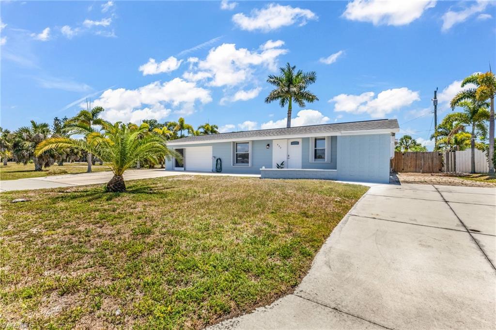 One or more photo(s) has been virtually staged. ASSUMABLE FLOOD INSURANCE POLICY! It’s easy to buy a house in Florida 25 minutes from the beach. It’s harder to find a home that actually gives you the lifestyle you’ve been looking for. Fully updated with nothing to do but bring the moving truck and start unpacking, this home gives you the opportunity to immediately start enjoying your own little slice of paradise. Want to build a pool? You’re already ahead of the game — both sides of the fenced yard have drive-through gates for easy pool-builder access, or for boat and RV storage, RV Hook-up included. Get your contract ready now and you could be swimming before summer’s over. The backyard is HUGE and full of potential to create the outdoor oasis you’ve always wanted. Whether you’re chasing the littles, letting the pups run free, gardening, entertaining friends, or simply enjoying the Florida sunshine, this yard gives you the space to do it all. The oversized lanai offers the perfect escape from the heat and is just waiting for chic outdoor furniture, string lights, or even your future outdoor bar setup. The shed is immaculate and ready to become the ultimate workshop, hobby space, storage area, or dreamy she-shed. Inside, the home has been beautifully updated with gorgeous granite countertops, white cabinetry, remodeled bathrooms, and what multiple people have called “the best shower ever.” The oversized 2-car garage gives you plenty of room for vehicles, tools, toys, and extra storage — plus protection during Florida storm season, did I mention a NEWER roof was put on in 2022? For added peace of mind, the home has a newer roof, has never flooded, and continues to stand strong as a solid block home. Whether you’re looking for your personal Florida retreat, a full-time residence, or an investment opportunity, this property offers flexibility. Great tenants are currently in place and would love to stay, creating immediate rental income potential. Prefer to move in yourself? Their lease expires 6/30/26, giving you options for the future. This isn’t just a house — it’s the chance to create the Florida lifestyle you’ve been picturing.