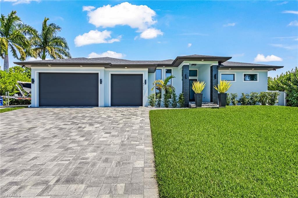 Elevated 2020 Custom Home with Resort-Style Outdoor Living in South Fort Myers. Located in the desirable Woodgate Estates area, this elevated custom-built residence offers modern construction, upscale finishes, and exceptional indoor-outdoor living near beaches, shopping, dining, marinas, and HealthPark Medical Center.
Built in 2020, the home features approximately 2,198 square feet of living area with 3 bedrooms, 2 bathrooms, and a spacious open-concept floor plan designed for comfortable Florida living. Interior features include floor-to-ceiling impact windows and oversized impact sliders that fill the home with natural light, 10’–13’ tray ceilings, fully tiled living areas, quartz countertops, solid wood shaker cabinetry, oversized kitchen island, induction cooktop with downdraft, soft-close cabinets and drawers, Level 5 smooth drywall finish, 8’ interior doors, LED lighting, RO drinking water system, full alarm and camera system, and spray foam insulation with fully insulated interior and exterior walls.
The primary suite offers a peaceful retreat with marble finishes, while the split-bedroom floor plan enhances privacy for guests and family members.
Positioned on an oversized approximately 0.26-acre lot, the outdoor living space has been thoughtfully designed as a private backyard oasis. Features include a brand-new 50’ saltwater reflection pool with negative edge, waterfall feature, oversized spa, lounging shelf, state-of-the-art lighting, elevated deck areas, shaded entertaining spaces, white marble and turf decking, projector-ready pool wall, and a fully built-in outdoor kitchen complete with infrared grill, sink, cabinetry, and refrigerator.
Additional exterior highlights include:
Elevated home design
50’ boat/RV parking pad
Oversized air-conditioned garage with cabinetry and sink
Beach sand backyard area
Sand-finished exterior
White vinyl fencing
Fully enclosed hedge for privacy
Irrigation well sprinkler system
City water and sewer with water conditioning system
Conveniently located in the highly desirable 33908 corridor with quick access to:
Sanibel & Fort Myers Beach
Marinas and boating amenities
Restaurants & shopping
HealthPark medical corridor
RSW International Airport
