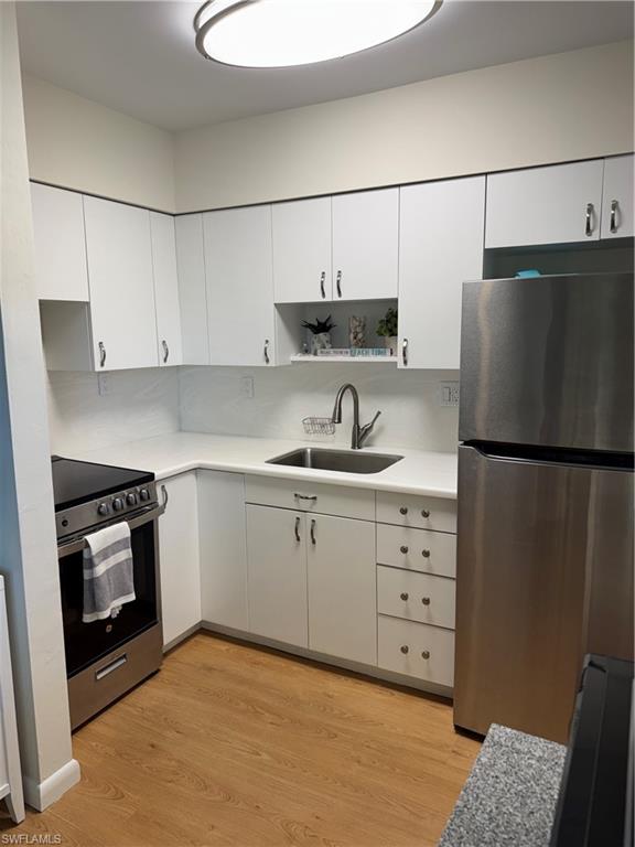 Beautifully renovated 2-bedroom 1 bath beach condo in the heart of Marco Island, offered completely turnkey and move-in ready.  This coastal retreat has been fully upgraded in the past 3 years, featuring a modern kitchen with upgraded cabinetry, quartz countertops and backsplash, and stainless steel appliances, stylish flooring throughout, updated bath with walk in shower, fresh finishes, and tasteful coastal decor.  Bright and airy living spaces create the perfect island atmosphere for relaxing or entertaining.  Ideal as a full-time residence, vacation getaway, or income-producing investment property.  Just minutes from Marco Island's world famous beaches, dining, shopping and entertainment.  Simply bring your suitcase and start enjoying paradise!