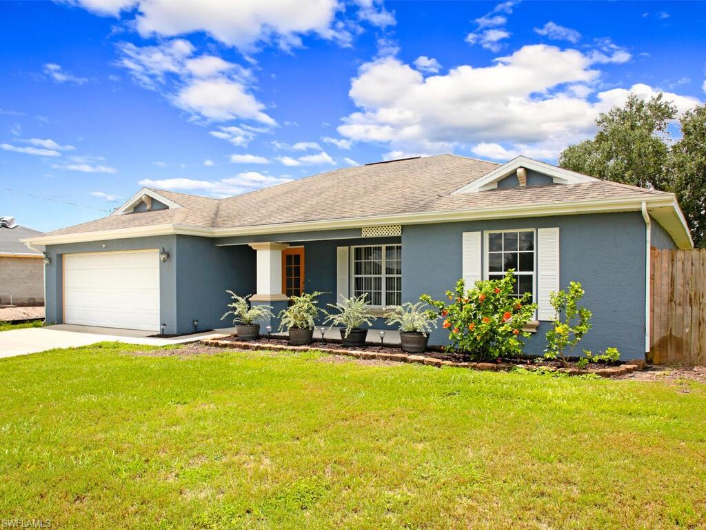 Come check out this spacious 3 bed /2 bath with an attached 2 car garage and fenced-in back yard on a corner lot. The home offers plenty of space with a split design, vaulted ceilings, and a bonus office area by the guest rooms. Updated with a new microwave and stove, new laminate floor, fresh interior paint, and newer fan fixture in the lanai. Convenient location near Wal-Mart shopping center, Home Depot, and more.
