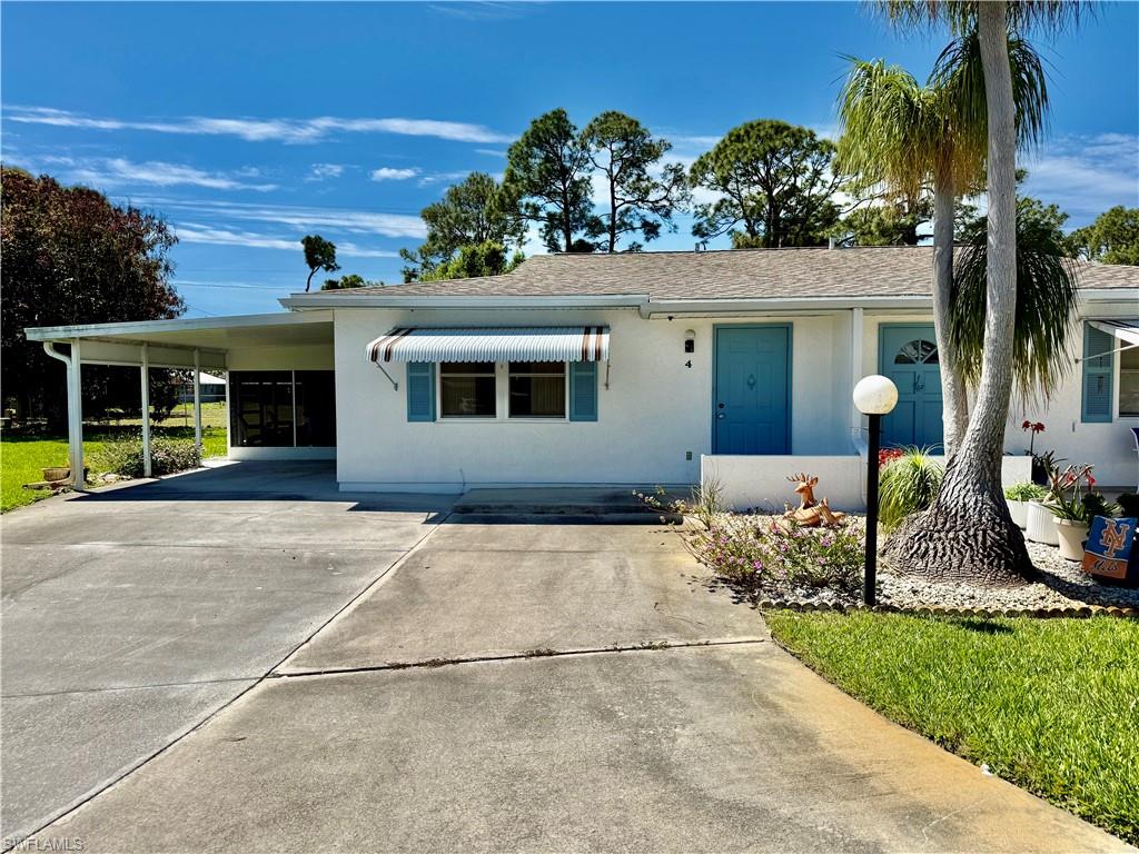 2 bedroom 2 bath Pinewood Villa located on a quiet low traffic Cul De Sac, plenty of privacy in the yard and plenty of extra parking for up to three cars, double driveway with covered carport, one enclosed family room/den with insulated roof etc. for additional living space, plus a 12 X 12 screened lanai as well, stucco exterior, roll down storm shutters, indoor laundry area with full size washer/dryer, in need of some cosmetics but priced accordingly, 55+ community, walking distance to stores etc., pets OK, Located just off of Homestead Rd just minutes to I-75, Ft Myers and SWFL International Airport. NO flood insurance required here. Lehigh is the highest elevation in Lee County.