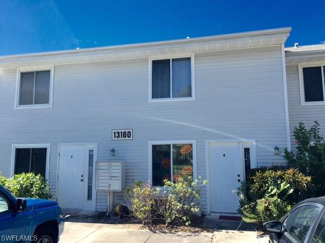 Well kept spacious townhouse in Pet Friendly Community! Located in a well kept develpment on a private cul-de-sac street off McGregor Blvd. conveniently located with quick access to the beaches, shopping, dining, Cape Coral bridges, schools and the airport This home features two large split bedrooms with large master closet, vaulted ceilings with fans. Living and dining area with new wall to wall carpet. The kitchen has an open view to the living area with a pass through.  Half bath on first floor. Laundry room, with full sized washer and dryer and storage. Bonus of two screened porches, one off the living area with storage and on off the master bedroom. Enjoy large green space and no rear neighbors and convenience of parking at your door. Opportunity knocks for year round, seasonal living or investor with a long term tenant in place until Feb 29, 2016.
