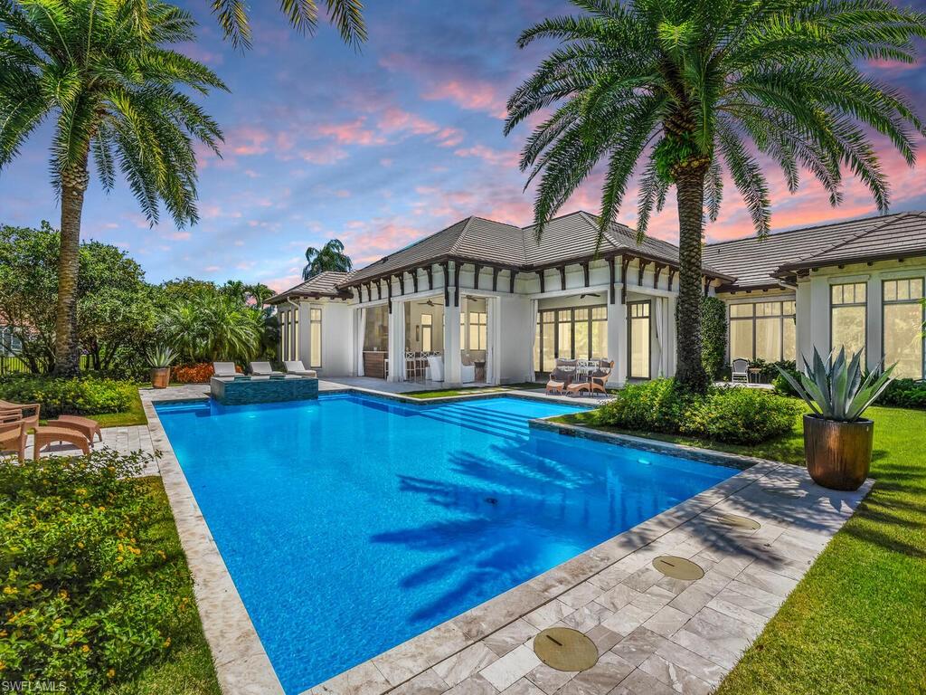 Exceptional Single Level Golf Course Estate on Oversized Lot (.55 acres) nestled on a quiet cul-de-sac street in the heart of Pelican Bay.  The Master Wing will exceed your Expectations!! Several extra Cozy Spaces in this Home for Exercise Equipment, Extra Office/Desk Space, or Extra Sitting Room - Whatever your Needs.  Outdoor Living Oasis with Expansive Western Exposure, Oversized 50’ Pool,  8’ Infinity Spa, Large Deck with all Day Sun, Gas Fireplace, Outdoor Kitchen, Motorized Lanai Screens & Shutters and Pool Bath.  Upgrades Include: Wide plank Wood Floors, Stone Bathrooms, Custom Cabinetry in Chef-like Kitchen (including Large Island, Butler’s Pantry, Wolf /Sub-Zero/Miele Appliances), Cristallo Countertops, Custom Ceiling Beam Work throughout home, Security System, Camera System, Ceiling Speakers, Sonos System equipment rack, Seamlessly Integrated powered Blinds throughout, Updated Control 4 Lighting System (Controls Lighting, Audio, Visual & Blinds), Whole House Generator and much much more!  Pelican Bay offers:  Beach Restaurants, Full-Service Beach Chairs and Umbrellas, Kayaking, Fitness Center, Tennis Courts, Soon to come Pickleball, Walking Paths, Biking Paths and much more.  The finest of Beaches, Art Centers, Shopping (Waterside Shops and Mercato), and Fine Dining are just minutes away!
