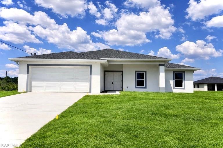 Brand New Home located in Northwest Lehigh on a CORNER LOT on a QUIET LOW TRAFFIC STREET, MOVE IN READY 3 BEDROOM 2 BATH WITH A DEN with a closet that may be used as 4TH BEDROOM. C.O. HAS BEEN ISSUED, double door entry to the den for privacy, 32 X 32 POLISHED PORCELAIN TILE FLOORS THROUGHOUT with 5 inch baseboards, impact resistant windows, covered front porch leads to large great room, cathedral ceilings throughout with tray ceilings in the master bedroom, shaker cabinets with soft close doors and drawers, pendant lighting over breakfast bar, QUARTZ TOPS in kitchen and baths, stainless steel appliance package, pantry, large dining area off of the kitchen, spacious master bedroom with walk in closet, private bath with dual sinks and tiled walk in shower, walk in closet in guest bedroom, indoor laundry room, covered porch in rear overlooking the backyard with plenty of privacy, double garage with auto opener, extra long driveway with plenty of parking, excellent location just minutes to I-75 and Ft Myers and SWFL International Airport. NO FLOOD INSURANCE REQUIRED HERE. LEHIGH IS THE HIGHEST ELEVATION IN LEE COUNTY.