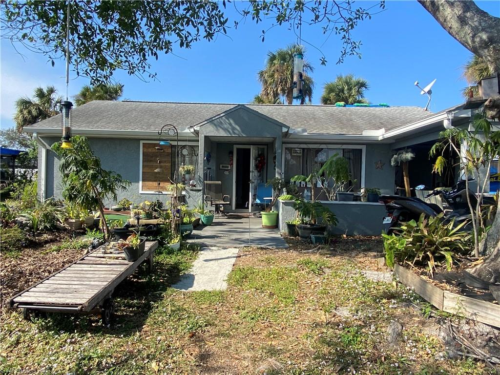 Sellers are downsizing and moving to the mountains! This home boasts a two year old kitchen with white cabinets, soft close door and drawers and beautiful granite counter-tops, as well as newer appliances and included washer and dryer. The open floor plan features luxury plank flooring, large windows and minimal damage from hurricane Ian (see remarks). Enjoy walk-in closets in the bedrooms and a LARGE flex space that can be used as a 3rd bedroom/den/office with access from the back of the house. Most of the electric panel, plumbing fixtures, fans, lights, gutters, and storage areas have been replaced in the last 2-3 years.