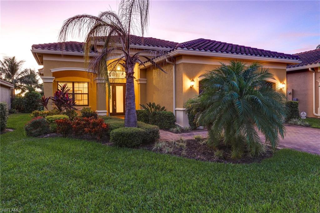 This move in Ready Burgundy Model home is in the heart of North Naples, and arguably the finest community in Naples.  A gently lived in home, Decorated with Warm Neutral Tones, Boasts of the finest appointments and upgrades to include Starting once you walk in the front door  a Drum chandelier with hanging Capize shells Custom Granite Kitchen Island, Raised Custom Cupboards, Kitchen Pantry, Granite Kitchen and Bath Counters, Stainless Steel Appliances, Designer Ceiling Fans and Lighting, window treatments and vertical blinds, 18 inch Designer Tiles on the Slant, Matching Faucets (and Hardware) Formal Dining Room, Tray Ceilings, Large Walk in Closet in Master Bedroom, Screened Lanai, Motion activated entrance lighting, security system complements of association.  If it could not get any better Riverstone is know for a world class club house and amenity center to include, a Resort style water fall pool, tennis courts, pickle ball courts, a game room, yoga room, and fitness room.