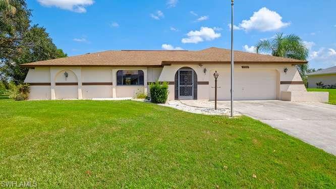 This home is located in Kings Bay Estates that is a gated community with large lots and only $350 annually HOA fees.  It is only 5 min from I-75.  The home is on a large lot in a small community of riverfront and lake front homes.  This home has been well maintained with new roof and A/C in 2011+/ -. Outside was just painted in 2016. Large screen room and a small workshop/storage with a garage door in back of the home. Inside has split bedrooms floor plan with an inside laundry and large second bathroom. The yard has irrigation from a well and a dock that overlooks a pond and wooded area.