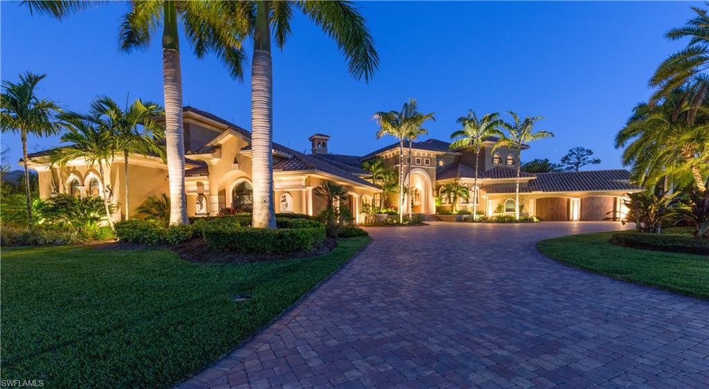 Custom Built Resort-Style Home in Devonwood Estates! The word "luxury" does not even come close to describing this stunning 7 bedroom home with almost 10,000 sf of living space... it will awe you from the first step in. Amazing attention to architectural detail with the use of stone, wood, and glass craftily creating a COZY feel for such a large estate home. This home features a first floor Guest Suite that is handicap accessible & equipped. This suite features a sitting room, washer&dryer and Walk-In Closet. Resort-Style amenities such as media room, wet bar, game room, sauna, steam room, firepit w/ mister system, 1,000+ bottle wine cellar w/ 2 humidors, and of course an amazing pool lanai. The massive pool lanai offers everything desired for outdoor living space- kitchen, fireplace, and water feature. NOT one detail in this home has been overlooked! Devonwood Estates is a gated community located in S. Fort Myers, and is one of the best kept secrets of luxury living!