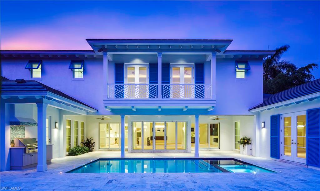Perfect elements from Florida beach cottages of bygone years introduced into modern classical coastal architecture. Only 3 years young & 3 blocks to the beach this is a gorgeous residence with soaring planked ceilings, wood floors, nano folding glass panel sliders opening onto your southern exposure pool / spa area with summer kitchen, quartz surfaces in a chef's delight for a kitchen, & so many other state of the art features are waiting just for you. Motorized roll down screens for lanai area, Persia White stone around your pool / spa / lanai / summer kitchen areas, wet bar with wine fridge, gas cooktop in kitchen, master suite with incredible master bath plus study (or 5th bedroom) with full bath (that also doubles as pool bath) all on ground floor, 3 beautiful guest suites upstairs with French doors & cove lit ceilings. Circular paver driveway with gorgeous evening and night time ground lighting ... truly a home that is inviting, functional, accommodating, & plain old fashioned feels great! When you review your options & the variety of selections in the marketplace, you will find yourself back here to feel the finest blend of warmth, style, location, & uncompromising comfort.