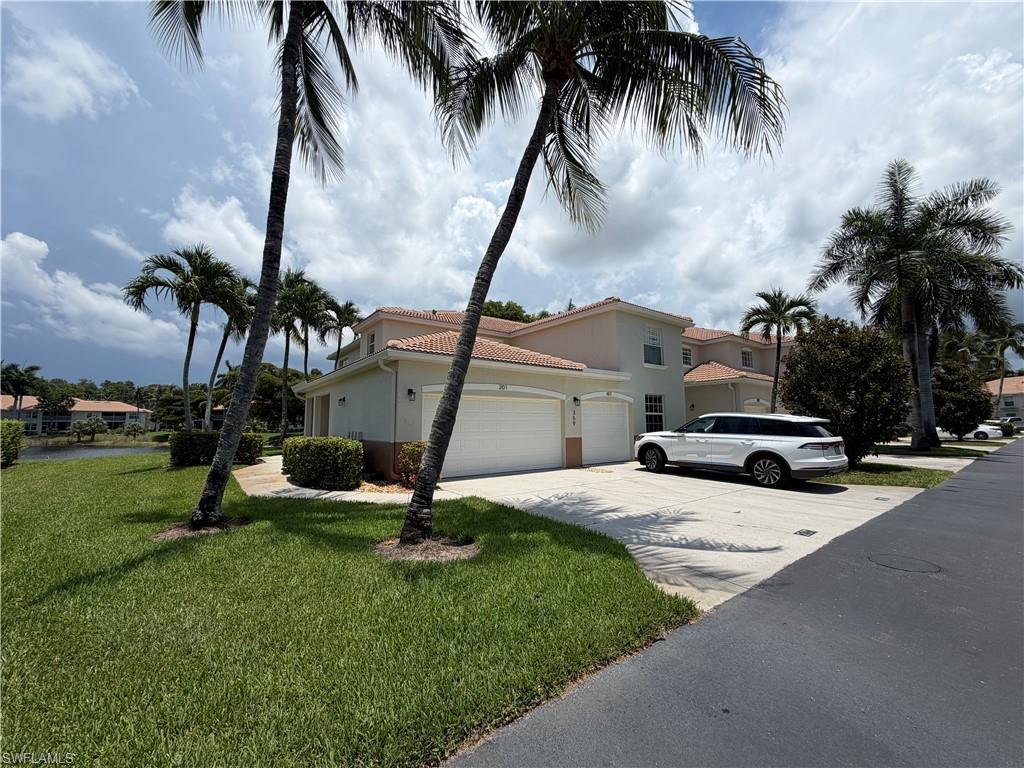 ANNUAL RENTAL - 3 BED / 2 BATH CONDO WITH 1 CAR GARAGE IN DOVER PLACE. First-floor 3-bedroom, 2-bath condo in Naples with an attached one-car garage and in-unit laundry. The primary bathroom features dual sinks, a walk-in shower and tub. Main living areas have tile flooring; the kitchen includes quartz countertops, stainless steel appliances and white cabinets. Enjoy a screened, covered lanai with a lake view. Dover Place community amenities include a pool, tennis court, clubhouse, play area and streetlights.