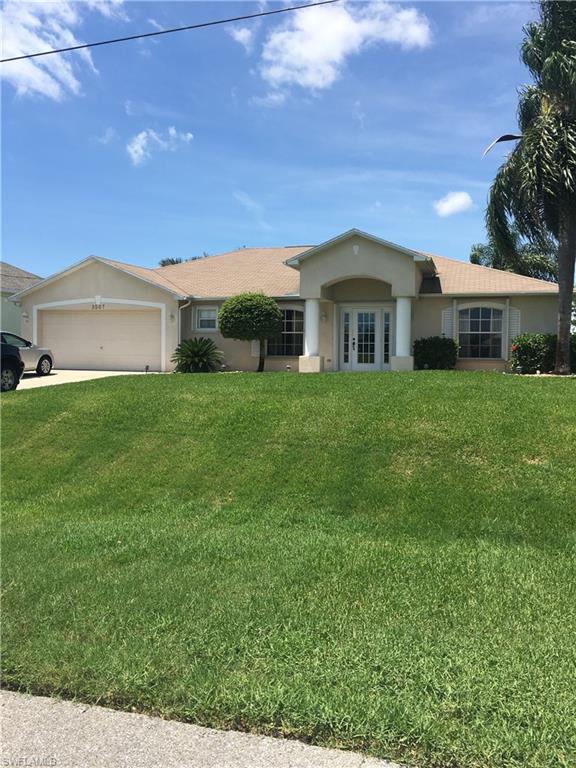 JUST REDUCED! MOTIVATED sellers welcome you the this meticulously kept gulf access home. Located on 150' canal with intersecting canal view. This 3/2 /2 split plan has all the charm and amenities to call home. This home features formal living and dining. Eat-in kitchen with a huge island, granite counter tops and large pantry. Large family room with built-in entertainment area and french doors leading to screened lanai. Neutral colors and tile throughout. The master bath features dual sinks with separate shower. Beautiful Accordion style shutters and whole house R/O system, security system, wrap around boat dock and a 10,000 lb boat lift with canopy. Gorgeous neighborhood of upscale homes. Don't miss your opportunity - Make an appt. for your personal showing today!