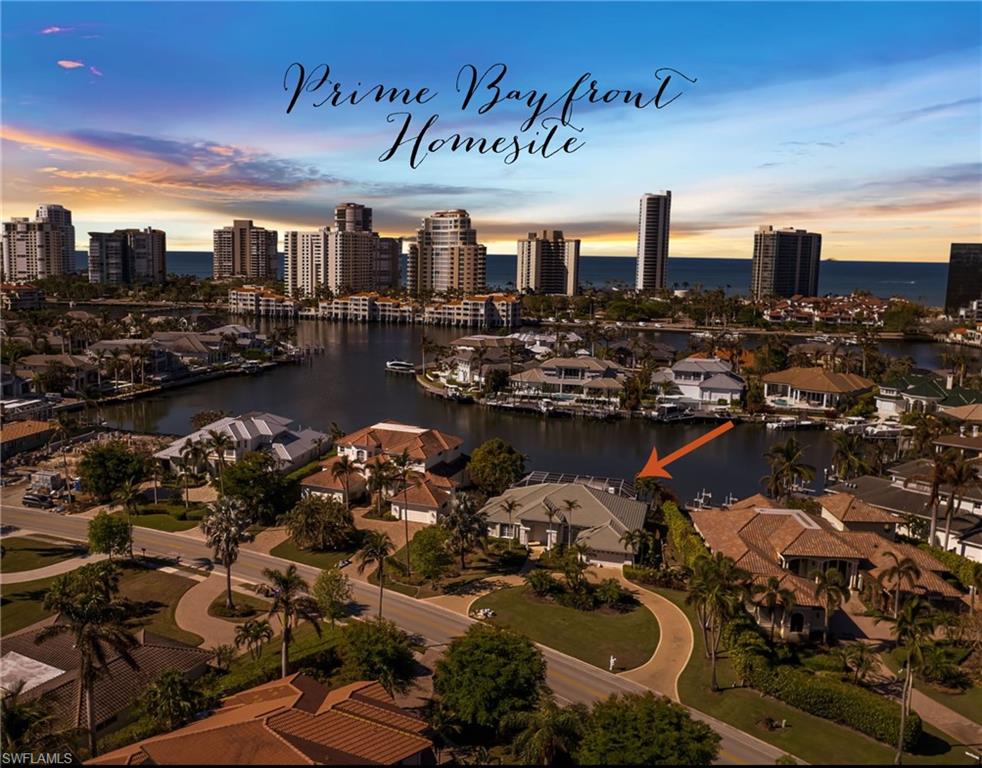 UNDER 5M!! PICTURES WERE TAKEN AFTER IAN. PRIME HOMESITE OPPORTUNITY ON VENETIAN BAY IN COVETED PARK SHORE NAPLES! Perfect spot for your new dream home or choose to keep and renovate the current home! NEARLY 1/2 ACRE, oversized lot with 86 FEET OF WIDE WATER (BAY) FRONTAGE, 127 feet of width on the front, nearly 200 feet of depth on the north side, 160 feet of depth on the south side, and long gorgeous sunset southwestern VIEWS OF VENETIAN BAY!! AS IS boat dock and lift in place. Excellent boating access, EXCLUSIVE MEMBERSHIP TO PARK SHORE BEACH PARK, and close proximity to Venetian Village, Waterside Shops, renowned Downtown Naples, and More!! THE LISTING PRICE IS FOR LOT VALUE ONLY!! MAKE SURE TO CLICK THE PROPERTY WEBSITE (VIRTUAL TOUR) LINK ON THE LISTING FOR EXTRAS AND SCROLL TO THE BOTTOM FOR SPECIAL FLY IN DRONE VIDEO! SECONDARY VIRTUAL TOUR LINK TAKES YOU DIRECTLY TO THE FLY IN VIDEO! **The home did sustain water damage from Ian Flooding. NOTE: Home appears to have had inches of water inside the house, and a little more in the garage; home may be salvageable for repair/renovation if desired.