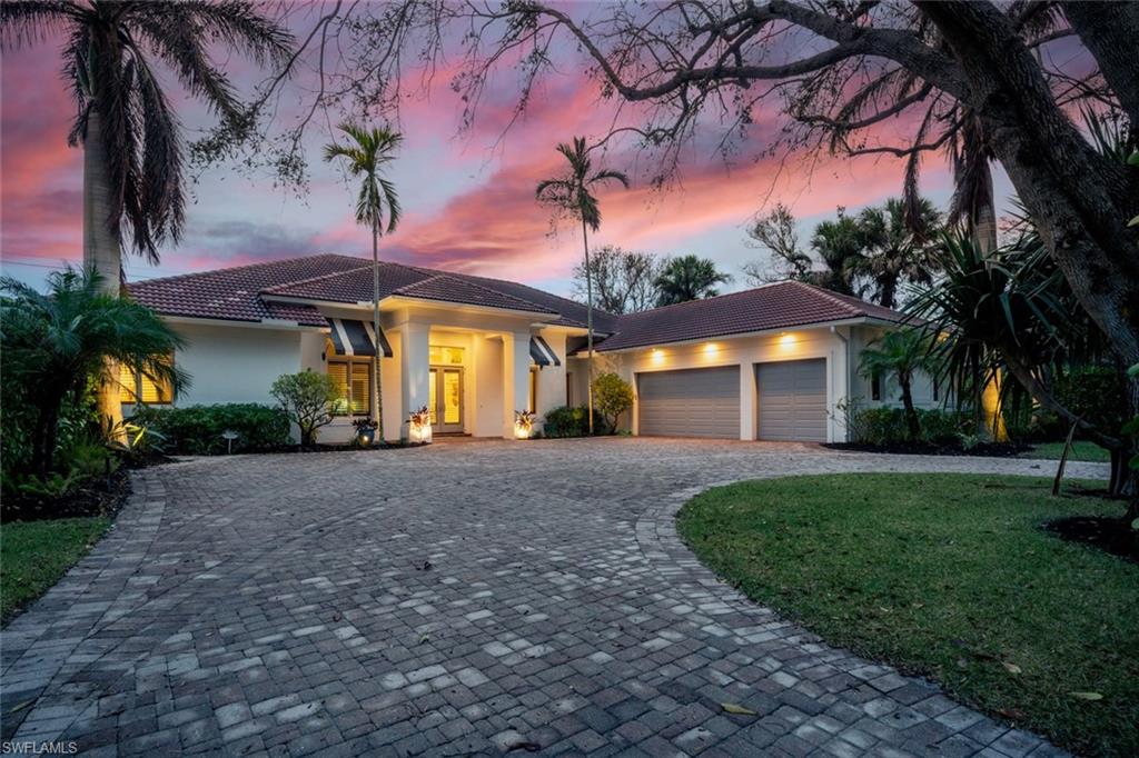 A wonderful opportunity to have a beautiful Old Naples residence within a few short blocks to the beach and the highly anticipated Four Seasons! This BCB built home has 3 en-suite bedrooms, with an office that can be used as a 4th guest room, 2 half baths, and a pool bath. Large chef’s kitchen with new 2021 Subzero and Wolf appliances, quartzite counters, and marble backsplash. Soaring 12’ ceilings in the main living areas, 8’ solid doors throughout, separate dining, family, and living rooms, breakfast area, oversized island, multiple sets of French doors opening up to the generous sized screened lanai and saltwater pool/spa makes this a fabulous home for entertaining! This lushly landscaped immaculate home boasts an open up to date floor plan, southern exposure, an abundance of natural light flowing throughout, and overlooking the newly reimagined Naples Beach Club golf course!
This home has many extras including solar power, air conditioned 3 car garage, impact windows, electric hurricane shutters on the lanai.
Walk, bike or use your golf cart to 5th Avenue, Cambier and Baker Parks, 3rd Street S. and everything else Naples has to offer! Move in ready, not a distressed property.