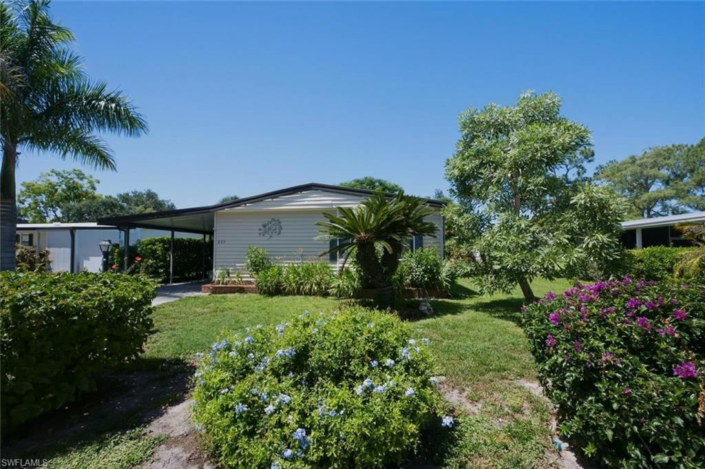 Lovely 1985 Manufactured Home in Riviera Golf Estates, a 55+ community that offers numerous amenities; new salt water heated pool/pickleball/tennis/bocce ball/shuffleboard/exercise room/billiards room and a huge clubhouse where all the social activities take place.  This home offers 2-bedroom, 2 bath 1060 sq ft of living space, the back lanai is glass enclosed for extra space for relaxing or entertaining.  Great opportunity to own a home (you own the land) just a short drive to the beautiful beaches, downtown Naples, great shopping and restaurants.  With a low HOA fee of just $144.00 a month which includes basic internet. It is one of the most affordable places to live in Naples!  A must see!