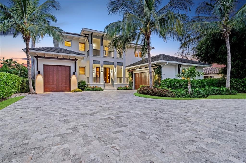 Rarely available Aqualane Shores home with 80 feet of water frontage and a brand new state-of-the-art dock for 1 or more boats and plenty of toys. Wake up to a cool breeze off the water and be steps away from your own large dock.  You are a mere minute to the open bay with quick direct access to the Gulf of Mexico!  The finest interior features include wide plank French oak & marble flooring, custom cabinetry, an epicurean kitchen with gas cooking, Meile appliances, double wall oven, butler’s pantry, and wine room. Enjoy indoor/outdoor living with a heated pool & spa, outdoor kitchen, spacious patio and sunroom with tranquil water views.  A timeless design by MHK blends coastal and west indies influences to deliver a lofty, light-filled esthetic that both welcomes and soothes.