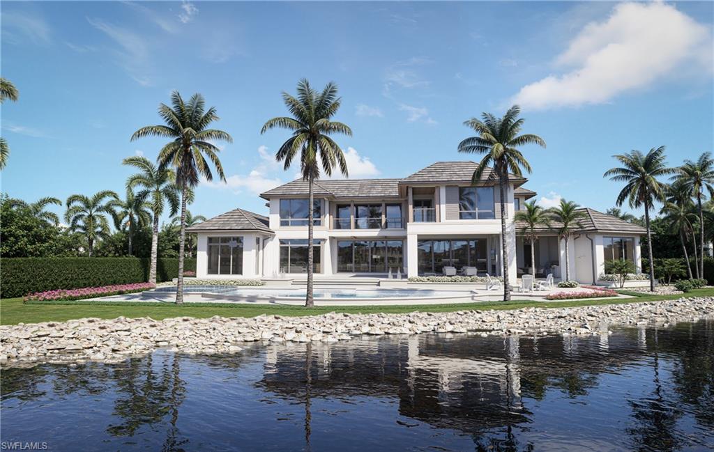 Experience a rare opportunity to own a spectacular new construction estate in Port Royal, timed for completion alongside the highly anticipated new Port Royal Club. Perfectly positioned at the end of a quiet cul-de-sac, this exceptional property captures sweeping, wide-water western views over private Buccaneer Bay — offering breathtaking sunsets and 179 feet of total water frontage. Built to today’s highest construction standards, this architectural masterpiece is being constructed by Toscana Homes, with plans thoughtfully designed by Stofft Cooney Architects and interiors curated by Carrie Brigham Design. Every element reflects superior craftsmanship, timeless design, and refined coastal luxury. The first floor is a true entertainer’s dream, where every room enjoys stunning water views and seamless indoor-outdoor living. Two spacious living rooms, an elegant dining room flanked by a walk-in wine cellar and full bar, and expansive glass openings create a setting designed for both grand entertaining and relaxed waterfront living. The gourmet kitchen is outfitted with Wolf and Sub-Zero appliances, custom Soho cabinetry, and a fully equipped walk-in prep kitchen to accommodate catered events or everyday ease. The primary suite is a private sanctuary, offering tranquil bay views and a spa-inspired bath featuring separate his-and-her bathrooms connected by an oversized walk-in shower, along with two generous walk-in closets. An additional guest suite and an expansive club room are also located on the main level — each overlooking the pool and sparkling bay beyond. Upstairs, four spacious en-suite guest bedrooms provide ultimate privacy and comfort. A second-level lounge offers a welcoming retreat for family and guests, complemented by a fully equipped fitness room and built-in sauna for a true resort-style experience. New construction opportunities with wide-water western exposure are exceedingly rare in Port Royal. Completion is anticipated for the end of 2026, with immediate Port Royal Club eligibility upon purchase — presenting a unique chance to secure both a legacy property and premier club access in one of the country's most prestigious waterfront communities.