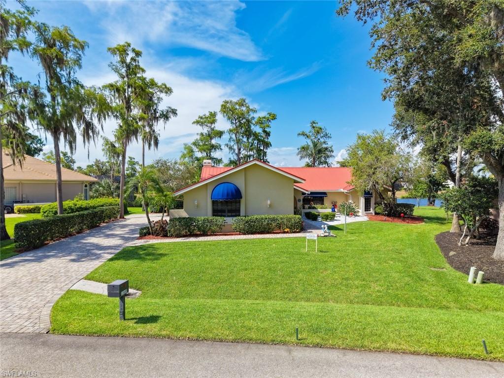 3 Bedroom, 3 Bath pool home located on one of the best lots in all of Fiddlesticks. Lake to Golf Course views of the #15 Long Mean. Driveway enhanced by pavers. Pool deck also with pavers. Cathedral ceilings in main living areas. Newer metal roof in 2023. Main house living area is 2,522 sq ft. Additional approximately 300 sq ft is a dedicated office off the garage (total A/C space approximately 2,800 sq ft). Garage space for 2 cars plus golf cart. Value priced at $549,900. Shop & compare. MANDATORY EQUITY MEMBERSHIP FEE OF $115,000 DUE AT CLOSING. ADDITIONAL MONTHLY FEES APPLY.