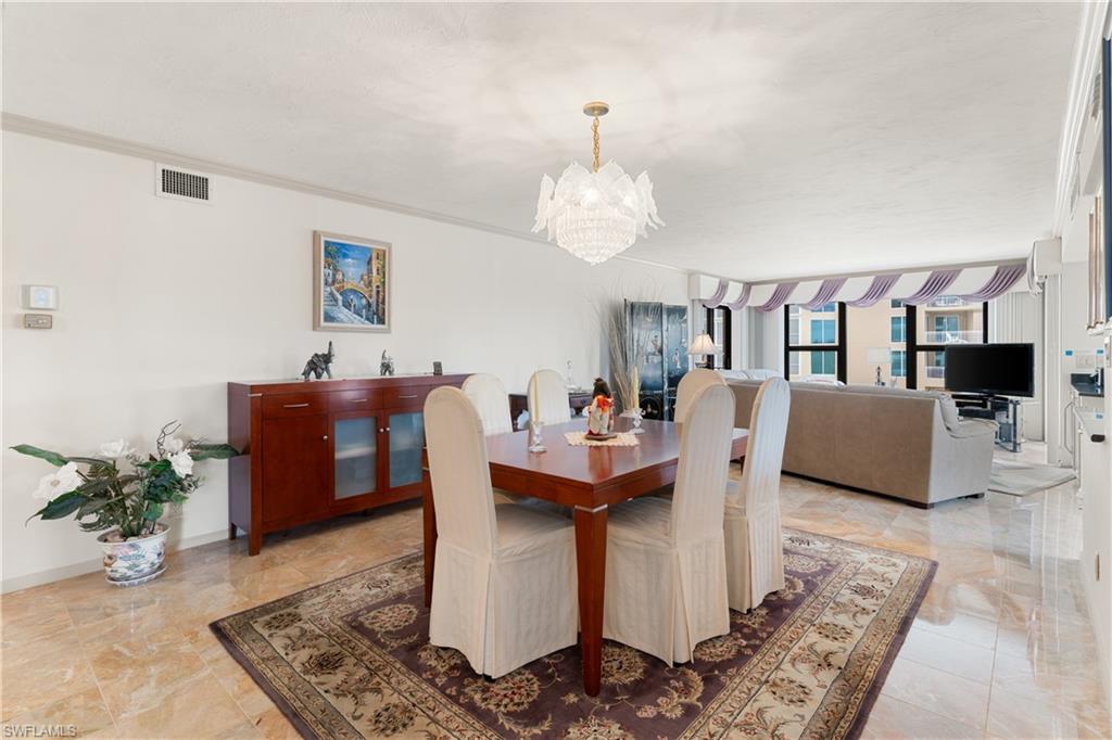 Experience beachfront living at its finest in this spacious three-bedroom, three-bath residence in the highly sought-after Solamar at Park Shore. Showcasing breathtaking panoramas that stretch from the sparkling Gulf of Mexico to Venetian Bay, this exceptional home offers two private balconies where you can enjoy unforgettable sunrises, sunsets, and coastal breezes.

Spanning more than 2,000 square feet, the thoughtfully designed layout is filled with natural light and provides the perfect canvas to create your dream coastal retreat. Interior features include granite countertops, stainless steel appliances, marble flooring, recessed lighting, elegant crown molding, a stylish wet bar complete with a wine cooler and seating, hurricane-impact windows and sliding glass doors, and a generously sized laundry room for added convenience.

According to the owner, the building's elevated location and beachfront positioning allowed it to remain unaffected by recent hurricanes, offering added confidence in its construction and location.

Residents enjoy an impressive collection of resort-inspired amenities, including a beautifully renovated beachfront pool and spa, fitness center, sauna, tennis and pickleball courts, shuffleboard, two guest suites, an outdoor kitchen with grilling area, complimentary beach chairs, an expansive sun deck, and an electric vehicle charging station.

The residence also includes an assigned covered parking space in the secure gated garage, 24-hour lobby attendant service, storage outside the unit, and one of only 12 oversized climate-controlled storage rooms, offering nearly 100 square feet of additional space.

For boating enthusiasts, slips may be purchased or leased through the nearby Venetian Bay Yacht Club. After a day on the water or relaxing on the beach, enjoy an easy stroll to Venetian Village or a short drive to downtown Naples, Waterside Shops, or Mercato for exceptional dining, shopping, and entertainment.

Whether you're searching for a luxurious full-time residence, seasonal getaway, or investment opportunity, owners may lease the property twice annually with 90-day minimum terms, and pets are welcome.