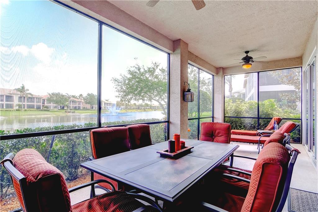 PRICE IMPROVEMENT. First floor Regency Reserve coach home situated mid-lake providing expansive water views. 2 BR + Den floor plan with oversized 40' screened lanai overlooking serene lake with multiple water features. Over 2000 SF of air conditioned living area with 9 foot ceilings, 16" neutral floor tile on the diagonal, and attached 2 car garage. Tastefully furnished with only non-furniture exclusions. Recently renovated master bath with rain head shower. Kitchen appliances have custom designer panels matching cabinetry, accented by newer glass tile backsplash. Updated ceiling fans and lighting throughout. Hunter-Douglas window treatments. Note: Owners are currently using Den as third bedroom. Regency Reserve is the newest and most desirable of the Vineyards' "Reserve" communities; it is located inside the North Gate with upscale community clubhouse, resort style pool and spa, and fitness center all within easy walking distance. Vineyards is a non-CDD community and offers many OPTIONAL membership choices for those desiring golf, tennis and enhanced social activities.
