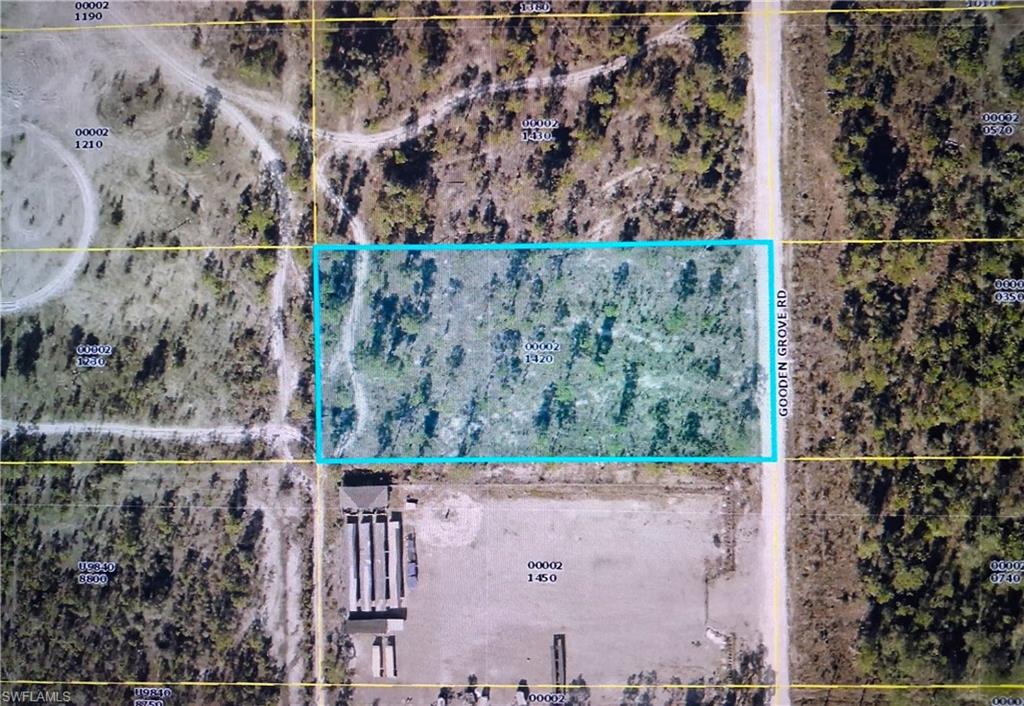 Wow! Over 1 acre of land ready for you to build to suit your needs and vision. This beautiful property features scattered native trees, providing natural charm and privacy without requiring extensive land clearing. Create your ideal layout and design exactly where you want it. Conveniently located close enough to enjoy all the shopping, dining, and entertainment of the City of Fort Myers, yet far enough away to appreciate the peace and privacy of country-style living. Don’t miss this opportunity. Wetland determination completed, additional permits needed to build.