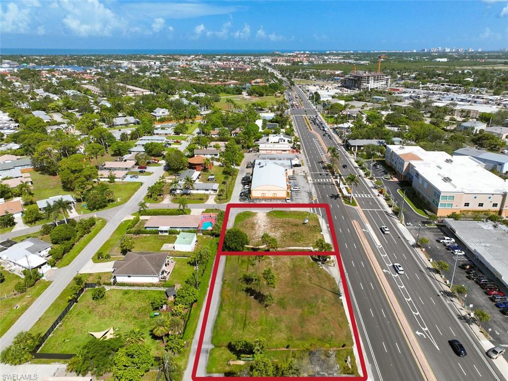 Pathway of Progress: Premier Commercial Properties on US 41.This is a rare opportunity to secure two contiguous parcels, totaling approximately 0.84 acres, located in the vibrant Gateway Triangle area of Naples. Perfectly positioned within the General Commercial C-4 zoning district and the Mixed Use sub-district of the Gateway Triangle Zoning Overlay, this property offers exceptional potential for developers, investors, and end-users alike. Featuring approx. 295' of prime frontage on US Highway 41 East, this site commands unparalleled visibility and exposure to high daily traffic counts. Its strategic location ensures effortless accessibility and positions your project at the epicenter of a rapidly transforming commercial corridor. Whether your vision includes luxury retail, a mixed-use development, professional office spaces, or a boutique hospitality concept, this property’s zoning and location provide unmatched flexibility to bring your ideas to life. This exceptional property embodies the Pathway of Progress, offering endless possibilities to capitalize on Naples’ flourishing market. Its prime location, flexible zoning, and proximity to key amenities make it a compelling choice for those seeking to establish or expand their presence in this sought-after area.
Time to secure this rare investment opportunity. Request detailed documentation, schedule a private tour, and explore how this property can be the foundation for your next successful venture.