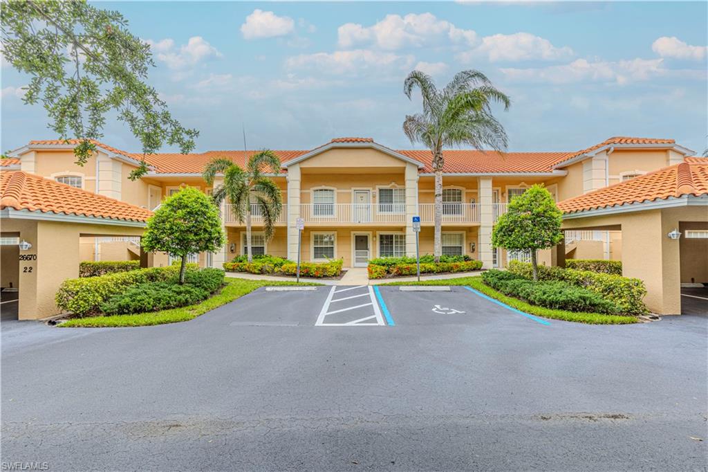Enjoy effortless Southwest Florida living in this beautifully maintained second-floor end-unit condominium in Bonita Fairways. Offering 2 bedrooms plus a den, 2 full baths, and approximately 1,406 square feet of living space, this residence showcases stunning long fairway views and desirable southern exposure. Vaulted ceilings and abundant natural light create an open, airy atmosphere, while the spacious split-bedroom floor plan provides comfort and privacy for both owners and guests. The well-appointed interior features a blend of wood and tile flooring throughout the main living areas, impact-resistant windows for added peace of mind, and a versatile den with closet ideal for a home office, reading room, or additional guest space. The screened lanai is the perfect place to enjoy your morning coffee or unwind while taking in picturesque golf course views. Recent updates include all new appliances with warranties in place, toilets, fans and light fixtures.  Located within the gated community of Bonita Fairways, residents enjoy resort-style amenities including a public pay-as-you-play golf course, clubhouse, resort pool and spa, fitness center, tennis courts, bocce, shuffleboard, billiards, library, and more. Conveniently situated just minutes from Bonita Beach, Barefoot Beach, shopping, dining, and entertainment, this residence offers the perfect combination of relaxation, recreation, and an unbeatable location. Whether you're seeking a seasonal retreat, investment property, or year-round residence, this exceptional condo delivers the Florida lifestyle you've been dreaming of. One or more photo(s) has been virtually staged.