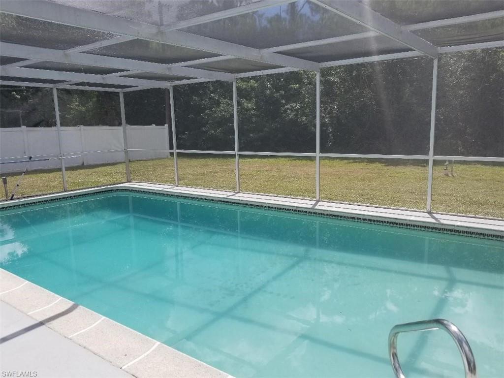PRICED TO SELL! This completely renovated 2/2/1 pool home is located in a quiet neighborhood, yet close to many stores, i.e. Publix, Home Depot, etc. The whole home was repainted on the inside, as well as outside. 
The home features over 1000 sqft of living space plus an enclosed Florida room with brand new ceiling and tile that has it's own new A/C wall unit. The home's master bedroom features its own bathroom, as well as walk-in closet with direct access to the Florida room. Both bedrooms feature brand-new carpet. The second bathroom features a new vanity and opens to the tiled living/family room. The kitchen has brand new countertops, as well as new hardware and opens up to the Florida room. 
The home includes a big screened in lanai with its own spacious pool to enjoy during the whole year, as well as a covered porch to enjoy the outside in any weather.
The home has a 1 car garage with a new garage door opener, as well as a covered carport