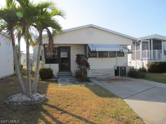 Clean and neat 1 bedroom 1 bath home located in Palmetto Palms. This home features all glass windows, a spacious lanai, newer roof over and air. There is oodles of storage for all of your beach gear. And you will need it, as you will be located right in the midst of it all. Sanibel and fort Myers Beach are within minutes, and Bunche Beach is right around the corner via a bike path. There is also an outlet mall, two groceries and a Walmart within biking distance! Palmetto Palms is a resident owned, 55 and older community which is totally gated. Pack your clothes and come on down, this house is ready to go!