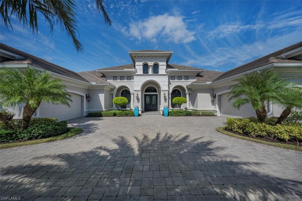 H3831 - This graceful home, situated on over half acre comes fully furnished/turnkey! Not only will you experience magnificent sunrises & sunsets but you can choose long golf/water views, lush privacy landscaping or both. Designed & furnished by Clive Daniels, the custom interior offers a grand great room w custom fireplace &  coffered ceilings. Add’l features include custom carpets, window treatments & upholstery, Schonbek lighting, designer wallpapers & custom built-ins. ALL artwork stays including originals! Bedrooms are en suite with tv & a bonus room w/tv can be 5th bedroom or second office.Fully equipped kitchen is a dream w oversized island, 6 burner cooktop, & walk-in pantry. The soothing Master Ste incl 2 walk-in closets, sitting area & generous master bath offering spacious shower w multiple shower heads, oversized soaking tub & double vanities. An amazing outdoor space is complete w kitchen/bar, fireplace, fire pit, saltwater pool/spa, tropical landscaping & retractable storm screens. Custom made safety carpets incl. Enjoy Kinetico water system, reverse osmosis in kitchen plus TWO 2 1/2 car insulated & air conditioned garages! Transferable House membership is available.