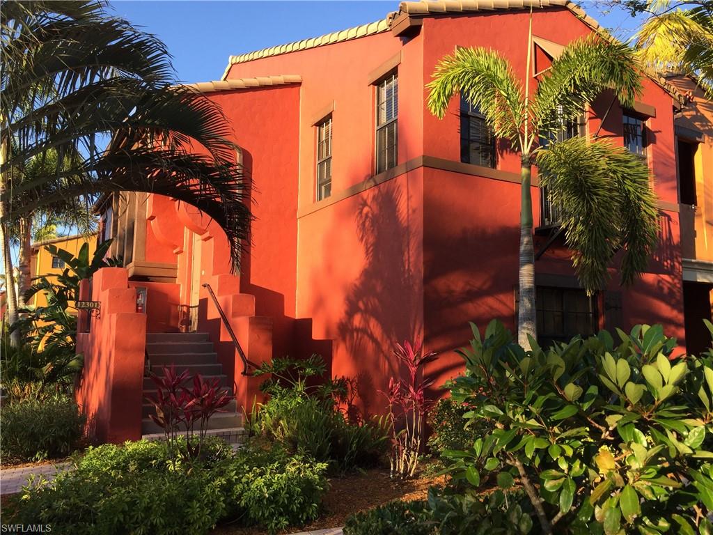 Welcome to this gorgeous two-story end unit townhome in the amenity-rich community of Ole at Lely Resort. This spacious split-level 3-bedroom, 2.5-bath residence lives like a single-family home, offering plenty of room to relax, unwind, and enjoy both privacy and comfort. The house is beautifully furnished and thoughtfully equipped with a well-stocked kitchen for those who love to cook, a separate bar area, and a walk-out balcony perfect for morning coffee or evening drinks. Enjoy two living areas, one on each floor.  Need to work remote - there are multiple office spaces to choose from and the unit is very quiet due to the impact windows and doors.  The primary suite features a king bed, walk-in closet, and ensuite bath with walk-in shower and jacuzzi tub for soaking. The guest rooms include queen beds, office desks, and walk-in closets. The downstairs living space has a bonus queen pullout couch. Every room includes a TV with streaming access and high-speed fiber internet for entertainment or productivity. At the heart of Ole is the Village Center, where you can enjoy a resort-style pool with poolside service, hot tub, kiddie splash pool, and sand play area, along with bocce, volleyball, pickleball, tennis, and basketball courts. The community also offers a movie theater, pub and bistro, and a state-of-the-art fitness center. Conveniently located near shops, dining, Starbucks, salons, and grocery stores—with downtown Naples and the beautiful Gulf beaches of Naples and Marco Island just 20 minutes away—this home offers the perfect seasonal retreat. Explore the Lely Resort lifestyle with biking, walking, jogging trails, golf, and spa amenities nearby.