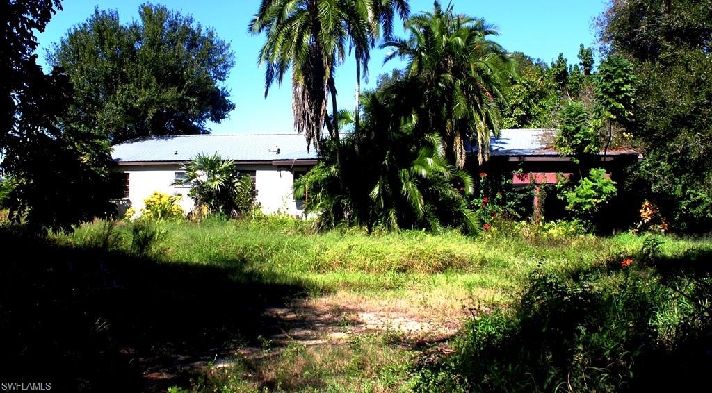 1.87 ACRES in LAKEPORT - 3 Parcels .67ac, 51ac & .69ac should you plan to locate Family * 2516sqft CBS Home * 21'x25' SCREENED RM * 11'x16' STORAGE * Metal Roof * 4BD/2BA * LIVING & FAMILY ROOMS * KITCHEN Oak Cabinets * Pine Tongue-&-Groove & Drywall * CITY WATER * HUGE OAKS & PALMS + NATIVE LANDSCAPE * HOME Blt in 1956 *  Someone needs to BRING BACK THE SPARKLE ** Speaking of Sparkle, Property is 6 miles from Brighton Seminole Reservation who host great Events, Casino & 3 Restaurants to enjoy + +