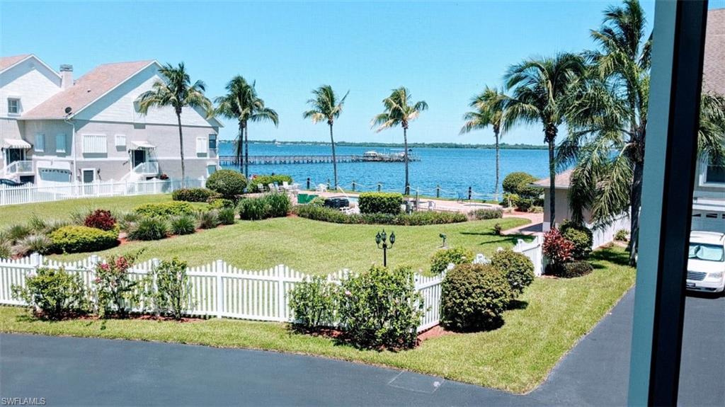 This beautiful townhome is situated on one the most highly sought after locations in the development which is close to the boat pier & clubhouse AND features its own private interior elevator so everyone can enjoy the amazing beautiful views from every level!!  It also has a dock/lift w electricity to purchase with it. River Place is a nice, private townhome community directly on the Caloosahatchee River!  This one owner property is highly upgraded, near the water & has the most magnificent tranquil sunsets! Well-built complex with concrete block & hurricane doors with direct access to the gulf and near downtown Ft. Myers for endless entertainment. This beautiful townhome features 2,650sf with a huge full living area on the first floor with kitchen & bathroom. Perfect as an in-law large quarter as well.  The very large master suite on the 3rd floor has high ceilings, a balcony with fantastic panoramic views of the river. The middle floor features a spacious river view with an open living room & kitchen configuration for entertaining. This home also has an in-residence laundry (not in garage as most of the other units). River Place amenities include pool/spa/boat launch/ramp/tennis.