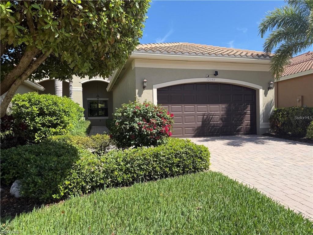 This gorgeous two bedroom, two bath villa with a den is situated on one of the most serene and peaceful lots in Marina Bay. The home features BRAND NEW HVAC ALONG WITH UV LIGHT, three walk in closets, and soaring 10 foot ceilings with crown molding throughout, including a raised ceiling in the primary bedroom. The upgraded kitchen offers granite countertops, enhanced cabinetry and appliances, and convenient pull out shelves. Bathrooms are finished with quartz countertops and custom mirrors. Ceiling fans with integrated lighting add comfort throughout the home. The community features a resort style pool, lap pool, kiddie splash pool, 4 pickle ball courts, 4 tennis courts, indoor/outdoor basketball courts, 1200 sq ft amenities center ( available for parties) 10 minute drive to Fort Myers International Airport. This must see villa offers an exceptional blend of style, comfort, and tranquility.
