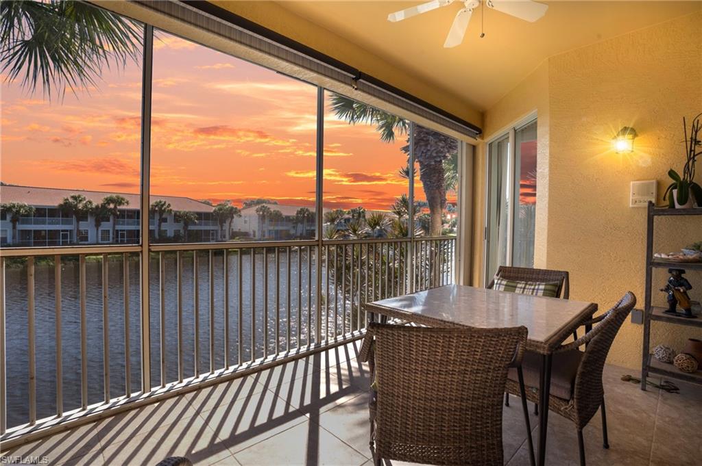 Best Value in Pelican Marsh! **Stunning Condo with Lake and Sunset Views in Premier Pelican Marsh** Experience the ultimate Florida lifestyle in this meticulously maintained 2nd level condo, perfectly positioned in the sought-after Pelican Marsh community. This light-filled home boasts breathtaking views from both the front and rear, with sunsets over the lake that will take your breath away and landscaping out your front windows. Featuring soaring ceilings, this residence feels spacious and inviting. The updated kitchen is a chef’s dream, showcasing new cabinet faces, sleek granite countertops, and stainless steel appliances. The primary suite is a true retreat, offering two walk-in closets and a spa-like bathroom complete with a soaking tub and separate shower. Step out onto the screened lanai, equipped with hurricane shutters, and enjoy serene water and sky views year-round. The new AC ensures your comfort, while the home's pristine condition reflects the care it has received. Located in the heart of Pelican Marsh, this value-packed, vibrant community is loaded with amenities, including tennis, pickleball, bocci, restaurant/grill, fitness center, and social opportunities. It’s also just a short bike ride to the beach and the upscale shops and restaurants of Mercato. Don’t miss this rare opportunity to own a piece of paradise!