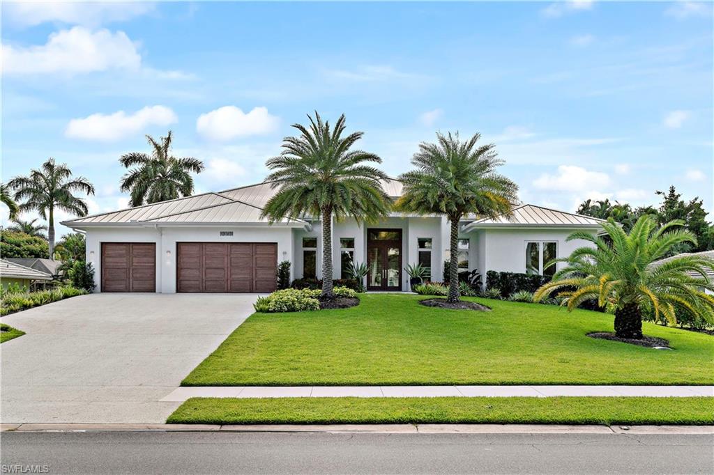 READY FOR OCCUPANCY!  Post Hurricane Damage Inspection conducted on 10/12/22.  Situated in the highly desirable Park Shore neighborhood on an ELEVATED LOT ABOVE FLOOD PLAIN, this 2020 build features 4 en-suite bedrooms, 2 half-baths + a den for optimal easy Florida living. Entering the impeccably furnished home you’re greeted with an incredible open-concept living space adjacent to the gourmet kitchen with Wolf & SubZero appliances and a massive waterfall island perfect for the at-home chef. Designed for easy entertaining, the home opens up to the expansive outdoor living space with spa, lap pool, outdoor kitchen and rare large-slab, shell-stone decking. The home exemplifies luxury living with wide plank European wood floors and single sheet porcelain bath floors. The home has impact windows and doors, solid mahogany garage doors, and WIFI-enabled components affording you the ability to control and monitor the home from afar. You’re walking distance to the beach and Venetian Village, with only a short golf cart ride to the shopping, dining and entertainment of 5th Avenue and 3rd Street. Don’t miss this opportunity to create the idyllic coastal lifestyle for yourself in Naples!