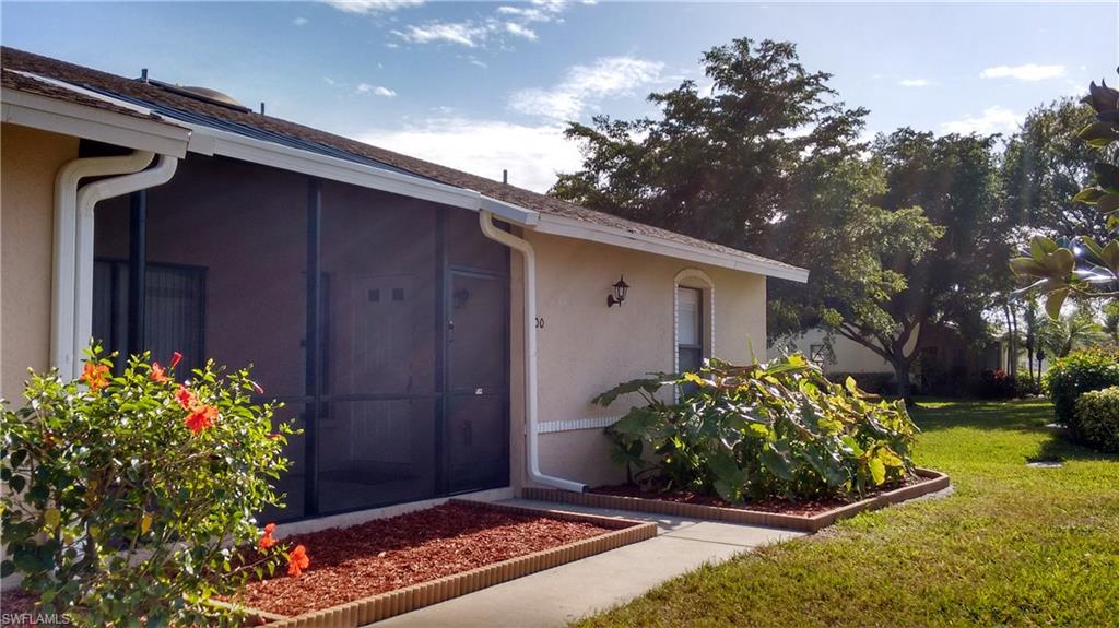 Beautifully updated  2 bed, 2 bath, greatroom split plan condo in Courtyards South with vaulted ceilings and large skylight. One of SW Cape's most sought after communities. Known for it's convenient LOCATION. Walking distance to Cape Harbor, Publix, Walgreens, banks and more in a tranquil, landscaped setting. Surrounded by upscale saltwater canal homes . New kitchen with 42" upper wood cabinets, granite counter tops and stainless steel appliances. Both bathrooms updated with Moen fixtures, porcelain tile enclosures with glass listello, wood cabinets with granite tops. Extraordinary detail throughout including all new door frames, doors and matching colonial trim, electrical outlets and wall switches, fans and lights, new 40 gal hot water heater, new 14 seer, high efficiency air conditioner and fresh paint. All main area floors are neutral 18 inch porcelain tile, both bedrooms are hand scrapped, stranded bamboo floors. Each bedroom/bath suite with walk in closet can be fully separated for privacy. New screen enclosure. Large heated Olympic size pool, large updated clubhouse with dining room, tv room, kitchen, bathrooms, racquetball, basketball and shuffleboard.