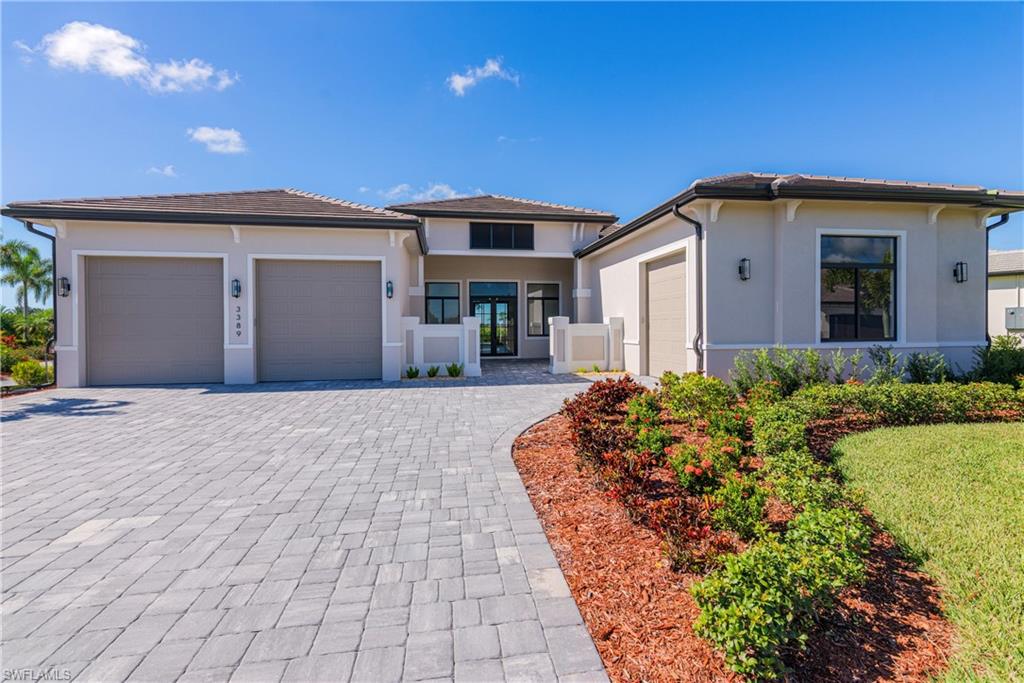 MOVE IN TOMORROW! NEW CONSTRUCTION.
Luxury custom home with 3,944 SF under air (5,347 SF total) featuring 3 BEDROOMS, DEDICATED OFFICE / BONUS ROOM, 3 FULL BATHS + 2 HALF BATHS, and a 3-car garage on an OVERSIZED 85’ WIDE ESTATE LOT with GOLF COURSE VIEWS in River Hall Country Club. Open floor plan with 12'+ CEILING HEIGHT THROUGHOUT (RISING TO 14' IN SELECT AREAS), oversized porcelain tile floors, multi-tiered tray ceilings with beams, IMPACT WINDOWS AND DOORS, electric fireplace, 10’ TALL SLIDERS, designer touches including wallpaper, custom cabinets and mantle, and a stunning quartz TV accent wall. Gourmet kitchen with UPGRADED BOSCH APPLIANCES AND A FULL-SIZE WINE REFRIGERATOR, upgraded quartz countertops with waterfall sides, a separate WET BAR FOR ENTERTAINING and COFFEE BAR both with decorative tile accents. Owner’s suite offers a spa-inspired bath with oversized glass-enclosed shower (fixed, rainfall, and body sprayers), and a freestanding tub. Outdoor living features a screen-enclosed panoramic lanai, POOL AND SPA, and an OUTDOOR KITCHEN. River Hall Country Club features a championship 18-HOLE DAVIS LOVE III, DESIGNED GOLF COURSE and FULL RESORT STYLE AMENITIES with LOW GOLF / HOA FEES. Amazing NO EQUITY MEMBERSHIP requirements, NO INITIATION FEES, and NO FOOD MINIMUMS. The Community also includes a Lakeside Pool and Tiki Bar Restaurant, a separate Golf Course Clubhouse Restaurant, Lagoon Style Pool, Full Gym, Pickleball, Tennis, an In-Community Elementary School, and a new Fire Station. Centrally located to I-75, RSW, and Downtown Fort Myers. Come tour this stunning, move-in-ready estate home! PLEASE NOTE: HOME IS VIRTUALLY STAGED FOR REPRESENTATIVE PURPOSES.