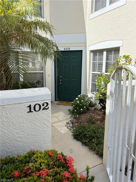 Discover the exceptional lifestyle offered by Unit #D-102 at Carlton Lakes in North Naples, where this beautifully maintained lakefront condominium combines privacy, comfort, and resort-style amenities just minutes from Naples' pristine sand beaches and other attractions. This freshly painted and updated condo provides spacious 2-bedrooms and 2 bathrooms, along with a large kitchen, living room and outdoor lanai that showcases a peaceful lake and fountain views. This condo comes with stainless steel appliances, updated flooring, attached carport parking (with guest parking), and abundant natural light. Enjoy an active, gated community with three pools, hot tub, clubhouse, fitness center, tennis, pickleball, bocce, basketball, walking trails, fishing pier, playground, and many acres of scenic preserves and lakes. Recent community improvements, include new roofs, freshly painted buildings, and newly repaved roads, enhancing long-term value, while conveniently walkable access to Seed to Table, Publix, The Strand shopping center, and proximity to Mercato, Delnor-Wiggins Pass State Park, and RSW International Airport.