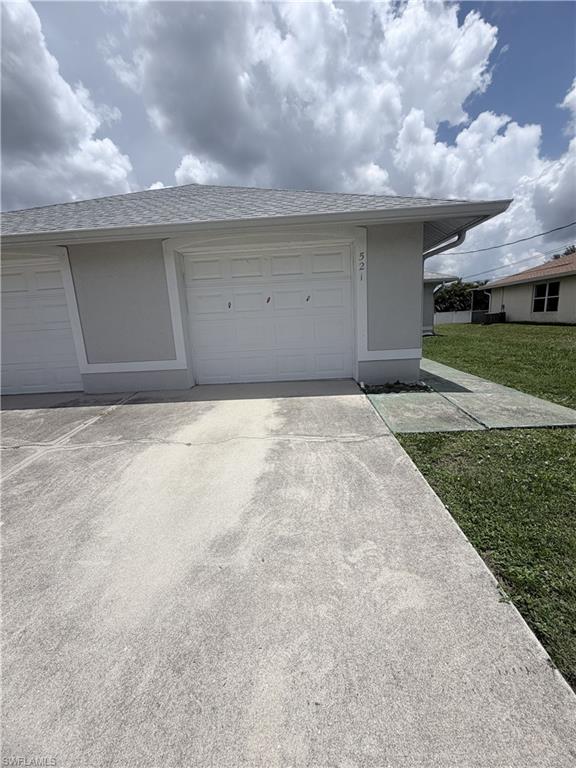 Spacious 2 bed/ 2 bath duplex with garage. Located in the center of Cape Coral on Hancock Bridge Parkway. Vaulted ceilings. Guest bath has walk-in shower. Stackable washer/dryer in unit. Lawn care included in rent.